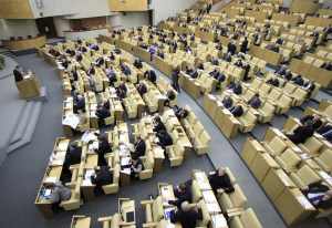 Russia's deputies discuss a nuclear arms reduction pact before the final vote during a session of the lower house of parliament, the State Duma, in Moscow