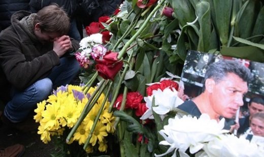 Moscow residents lay flowers at Russian opposition politician Nemtsov's murder site