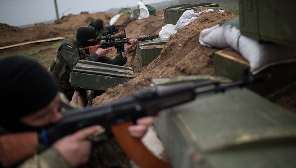 © AP Photo/ Evgeniy Maloletka