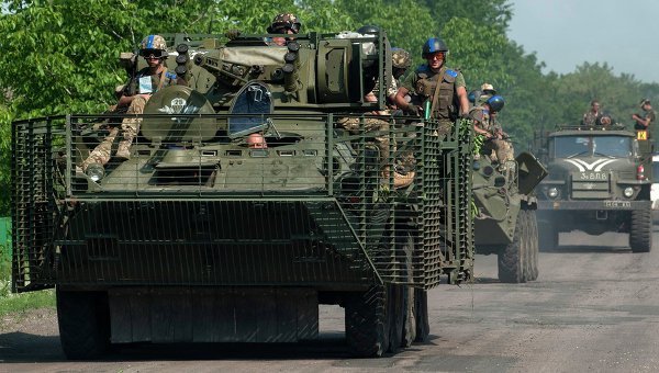 © AP Photo/ Evgeniy Maloletka